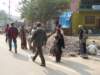 lapierreesttransportepardesfemmesquiportentceplateausurleurtte_small.jpg
